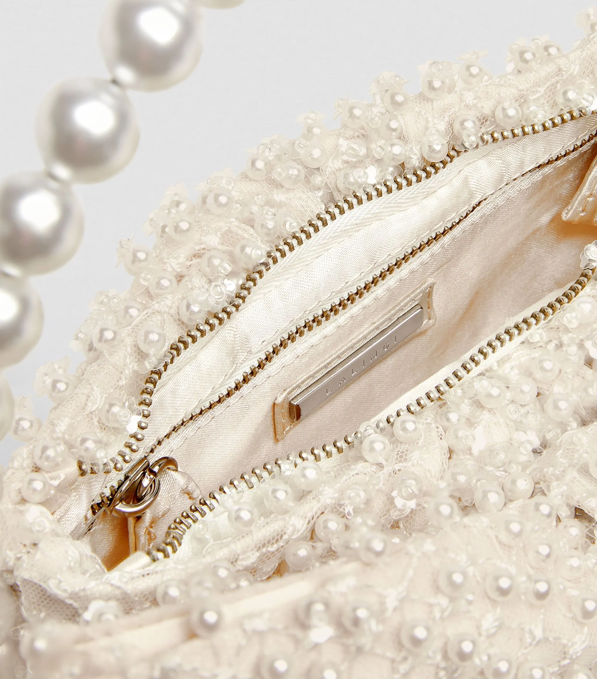 L'alingi Cream Exclusive Pearl-embellished Bow Clutch Bage